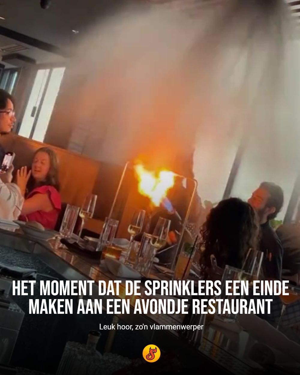 Het moment dat de sprinklers een einde maken aan een avondje restaurant