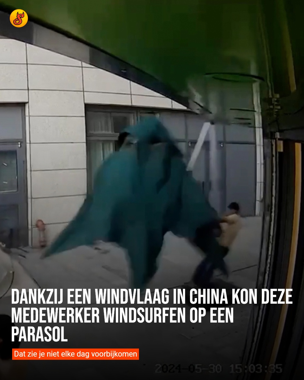 Dankzij een windvlaag in China kon deze medewerker windsurfen op een parasol