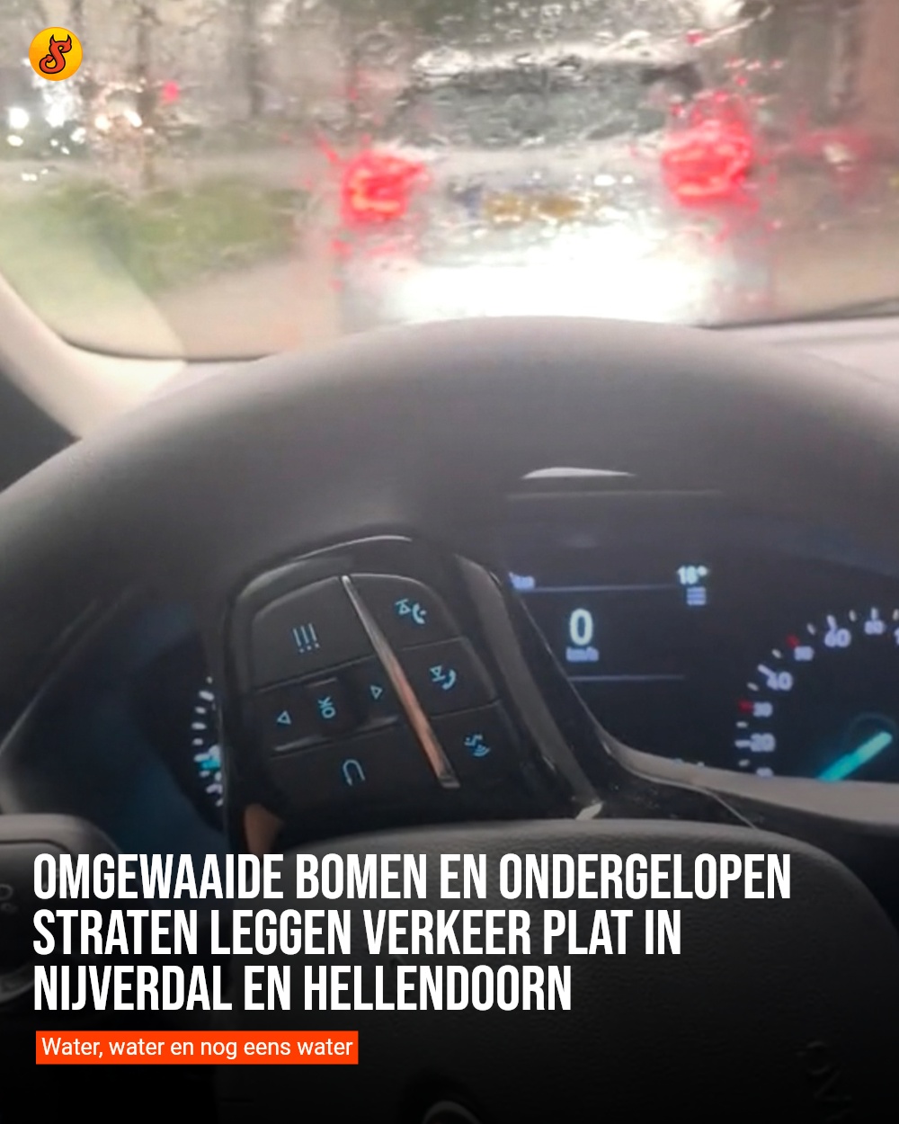 Omgewaaide bomen en ondergelopen straten leggen verkeer plat in Nijverdal en Hellendoorn