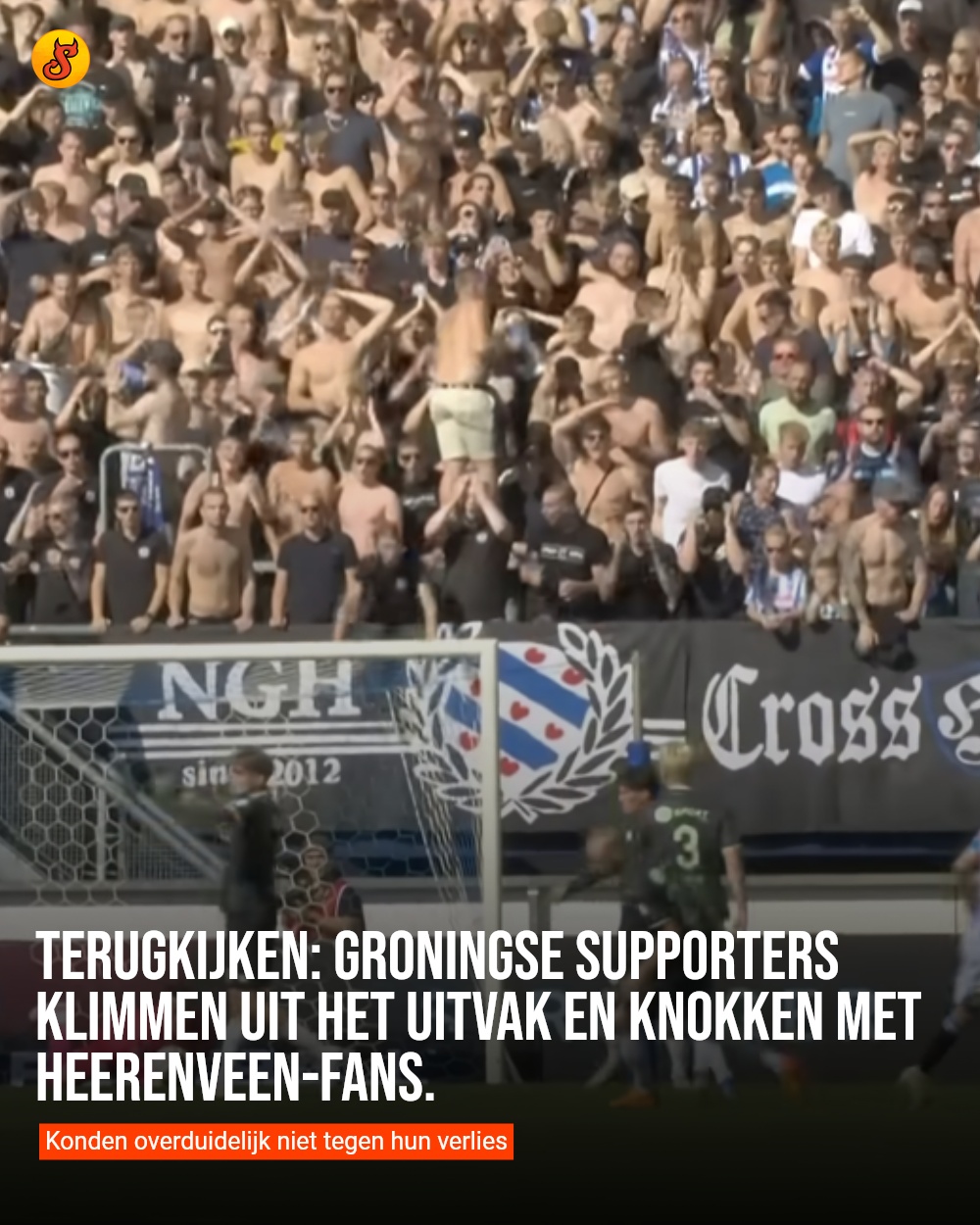 Terugkijken: Groningse supporters klimmen uit het uitvak en knokken met Heerenveen-fans.