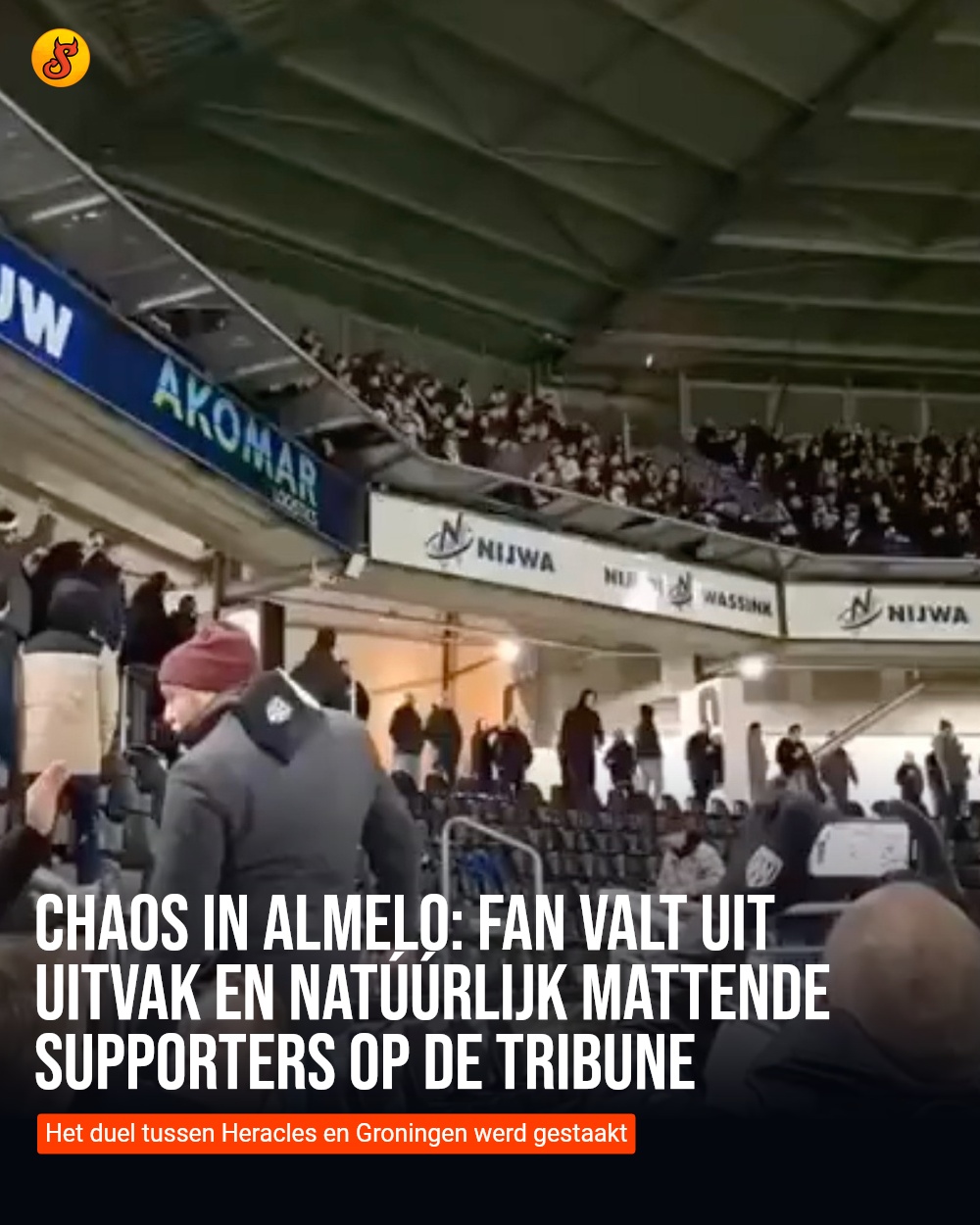 Chaos in Almelo: Fan valt uit uitvak en natúúrlijk mattende supporters op de tribune