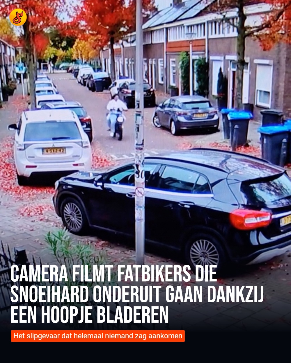Camera filmt fatbikers die snoeihard onderuit gaan dankzij een hoopje bladeren
