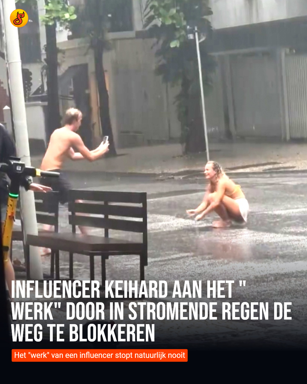 Influencer keihard aan het "werk" door in stromende regen de weg te blokkeren