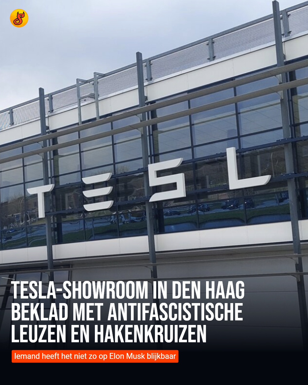 Tesla-showroom in Den Haag beklad met antifascistische leuzen en hakenkruizen