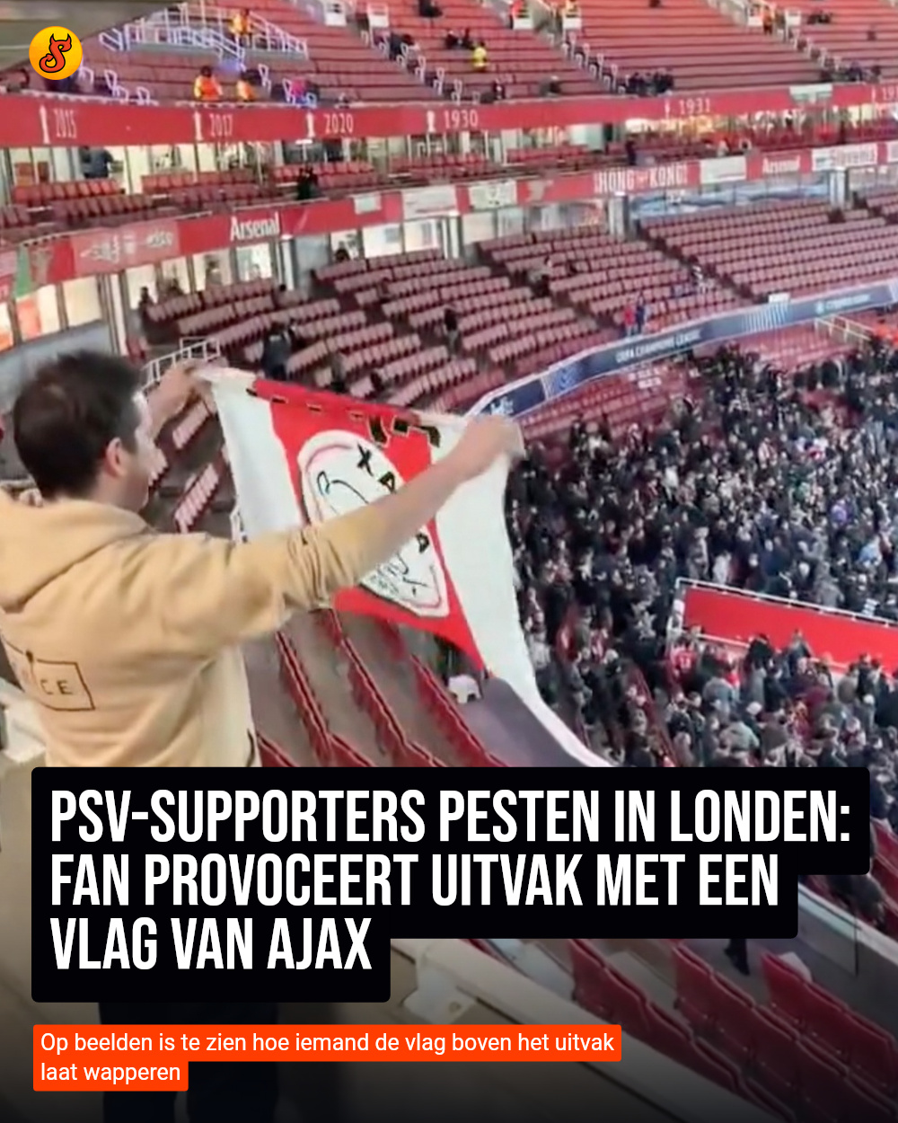 PSV-supporters pesten in Londen: Fan provoceert uitvak met een vlag van Ajax