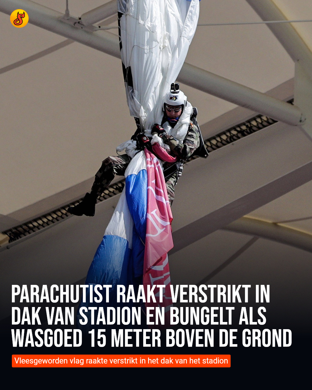 Parachutist raakt verstrikt in dak van stadion en bungelt als wasgoed 15 meter boven de grond