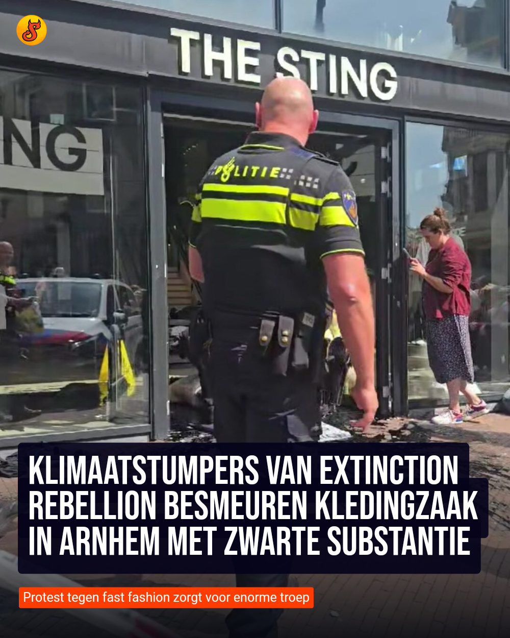 Klimaatstumpers van Extinction Rebellion besmeuren kledingzaak in Arnhem met zwarte substantie