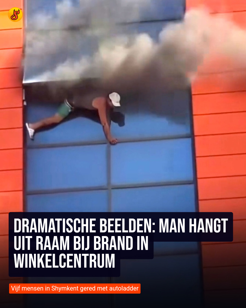 Dramatische beelden: Man hangt uit raam bij brand in winkelcentrum