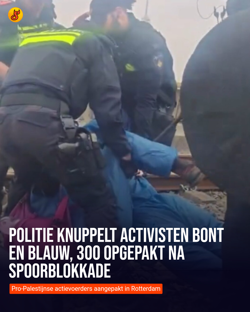 Politie knuppelt activisten bont en blauw, 300 opgepakt na spoorblokkade
