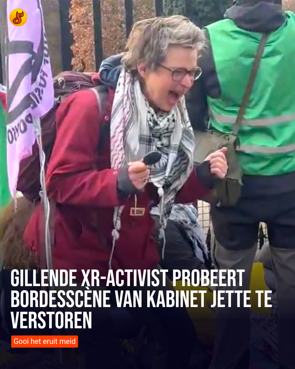 Gillende XR-activist probeert bordesscène van Kabinet Jette te verstoren