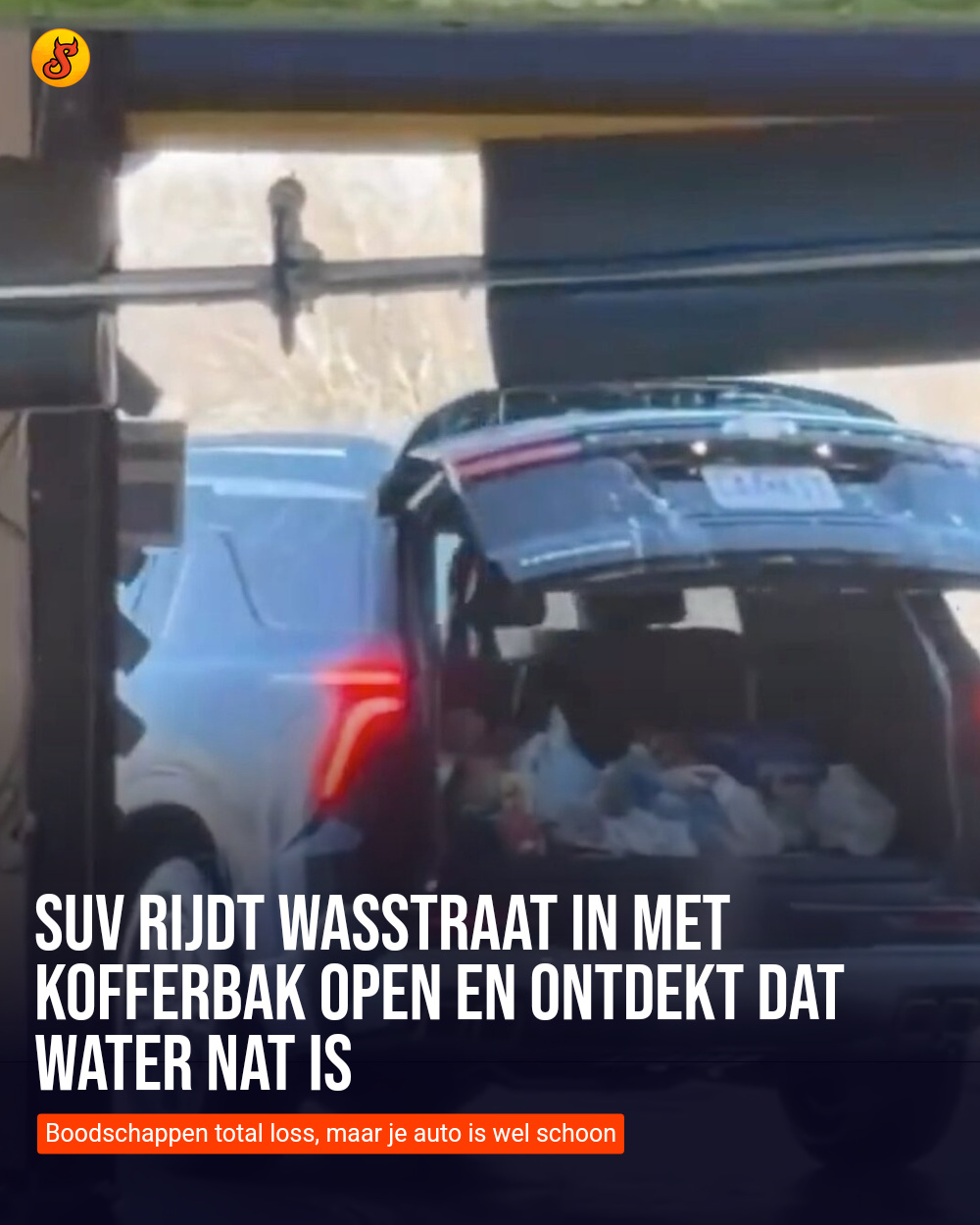 SUV rijdt wasstraat in met kofferbak open en ontdekt dat water nat is