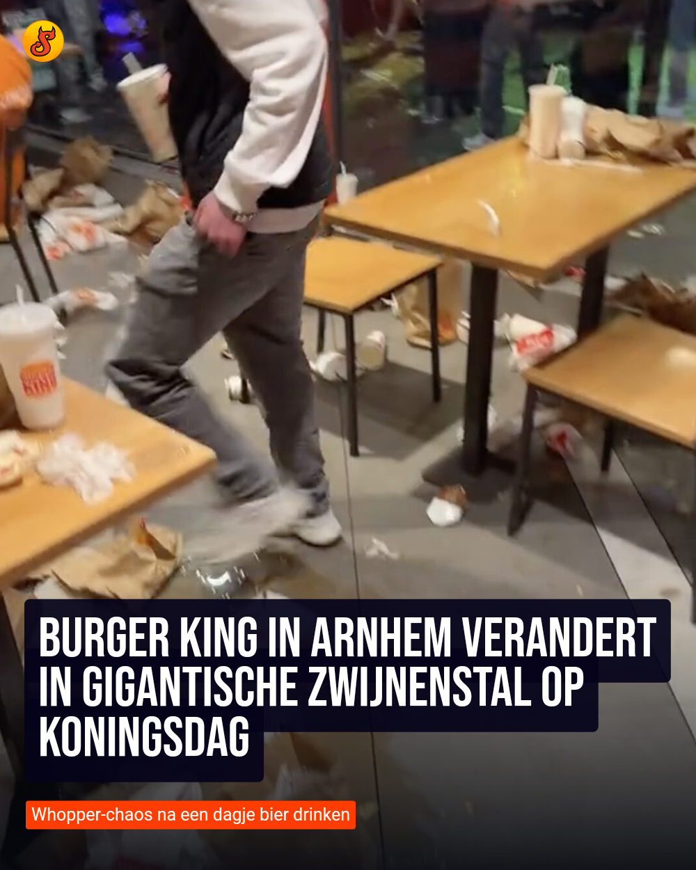 Burger King in Arnhem verandert in gigantische zwijnenstal op Koningsdag
