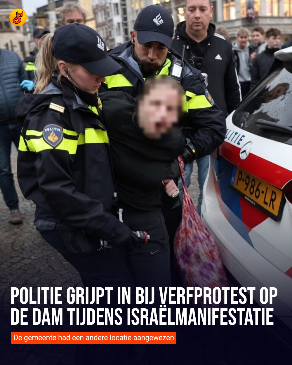 Politie grijpt in bij verfprotest op de Dam tijdens Israëlmanifestatie