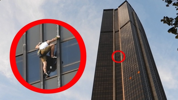 Poolse freeklimmer beklimt het hoogste gebouw van Parijs: de Tour Montparnasse