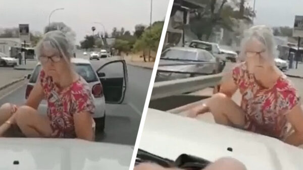Road rage-gekkie besluit op de motorkap te gaan zitten na een botsing