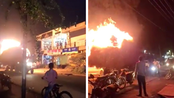 Dappere Ghost Rider rijdt vlammende tractor weg van drukke stad