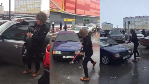 Siberische prankster besluit om verkeerd geparkeerde auto te slopen met een hamer