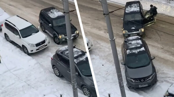 Russische foutparkeerder wordt zonder al teveel heisa weggesleept