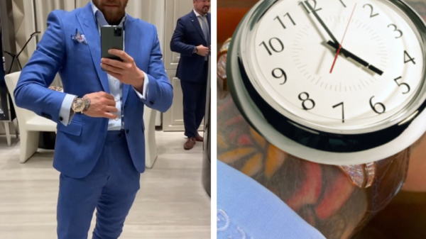 Conor McGregor patst met zijn nieuwe horloge (van een miljoen), pak én Rolls Royce