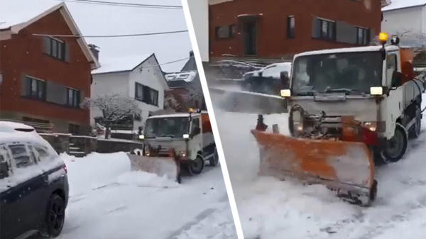 Blij dat ik glij: Franse sneeuwschuiver glijdt van heuvel en klapt tegen auto