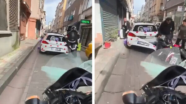 Doh. Stuntpiloot ziet uitgelezen kans voor een wheelie in een smal straatje