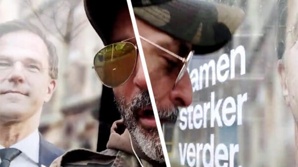 Billboard van Mark Rutte overgoten met warmte door John Wick van de Uriminati