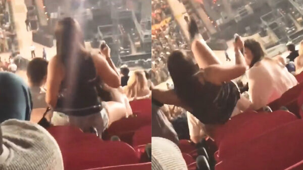 Dronken aandachtstrekster probeert de show te stelen tijdens een concert