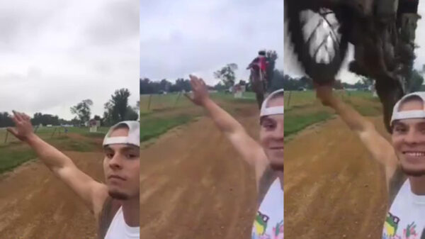 Een motorcrosser in volle vaart highfiven is het slechtste idee van de dag