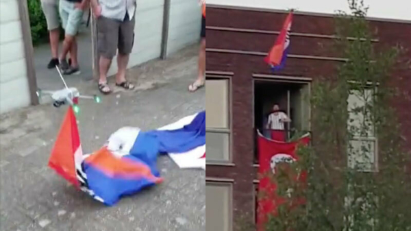 Je fanatieke Turkse voetbalbuurman trakteren op een Nederlandse vlag