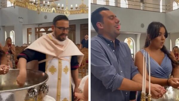 Kleine atheïst laat zien wat hij van het doopsel vindt