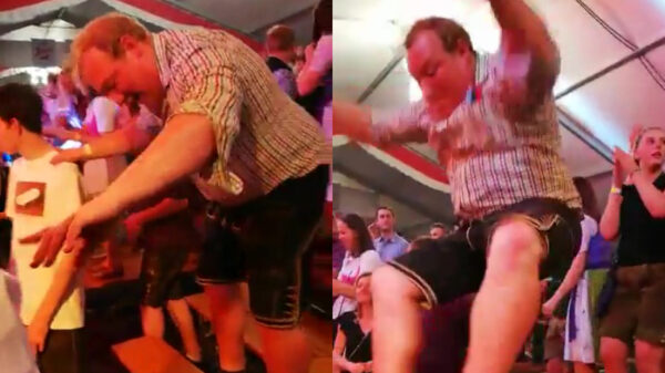 Dikke dronken Duitser bespringt een bankje tijdens Oktoberfest