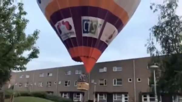 Kap'tein luchtballon kan niet mikken en komt neer in Utrechtse woonwijk