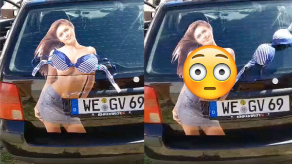 Duitser trakteert overige verkeer op een beetje zomer tijdens die ellendige regenbuien