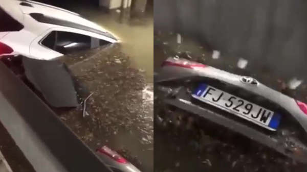 Italiaanse parkeergarage lijkt na storm op autokerkhof