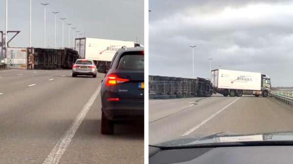 Vrachtwagen verliest het van Eunice en wordt op de Moerdijkbrug omvergeblazen