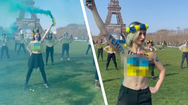 Franse feministengroep Femen gaat in Parijs uit de kleren voor een anti-Poetinprotest bij de Eiffeltoren