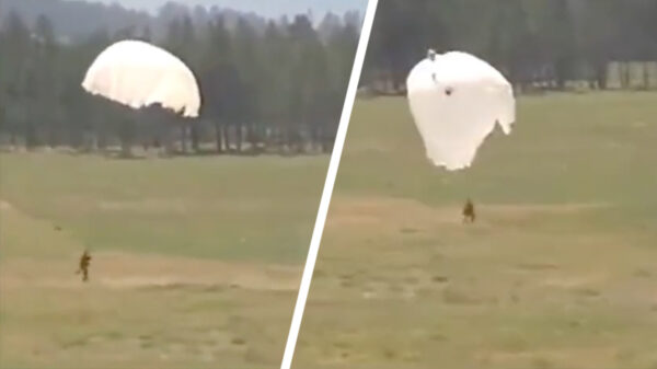 Deze parachutist heeft een hele beroerde dag door zijn gevecht met de wind