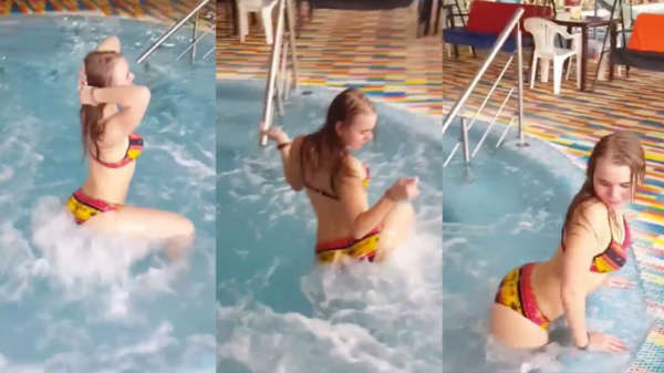 Zwembad-twerker Julia vermaakt zich wederom prima in het zwembad