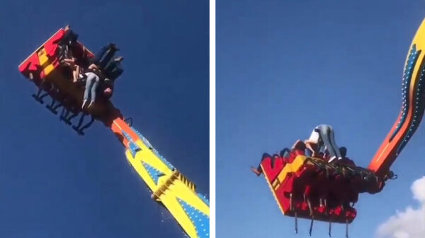 Tiener bungelt gevaarlijk uit een attractie op een kermis in Paraguay