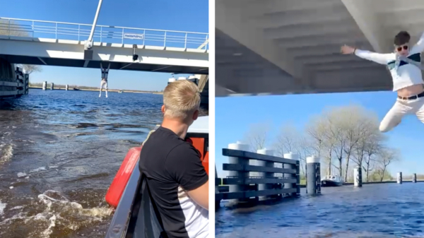 Ouderwetse brughanger haalt op Eerste Paasdag een nat pak in het Friese Oudega