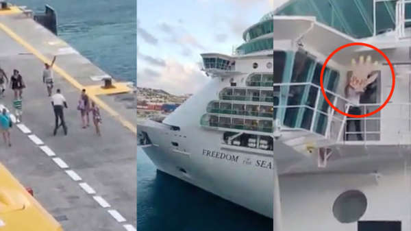 Passagiers die de boot missen op Sint Maarten worden uitgezwaaid door medewerker met megahand