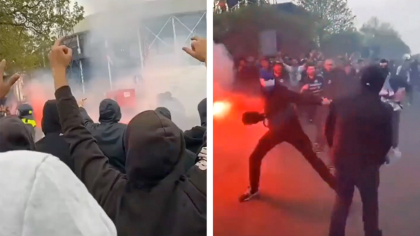 Feyenoord-fans voor de wedstrijd met Marseille met vuurwerk en borden bekogeld