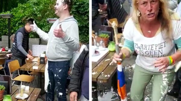 Aanhangers actiegroep Voorpost met een lading verf bekogeld op het terras