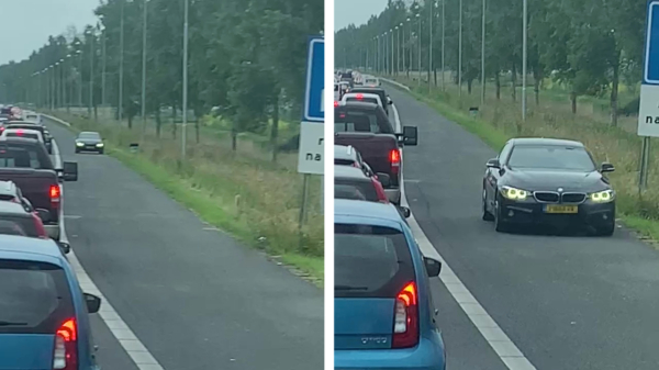 BMW-rijder vindt de file bij Lelystad veel te lang en maakt via de vluchtstrook rechtsomkeert