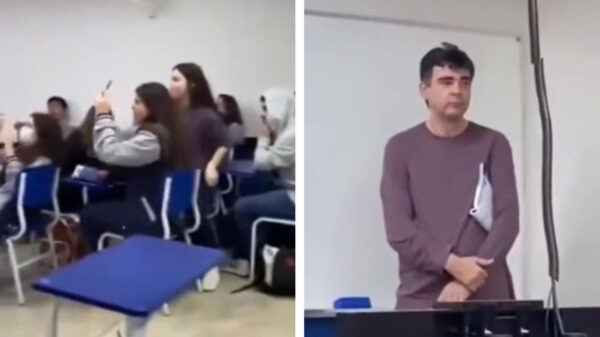 Leraar zet binnengevlogen vogeltje weer buiten als een ware eindbaas