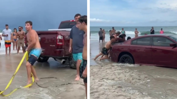 Een vastgelopen Dodge Charger op het strand van Florida lostrekken valt nog niet mee