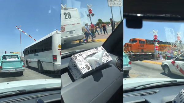 Idiote buschauffeur weet ternauwernood crash met trein te voorkomen