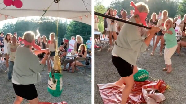 Oma wordt gevloerd tijdens een ouderwets potje piñata meppen
