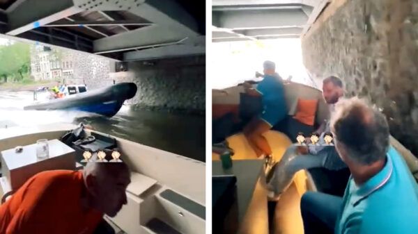 Bootje in Amsterdam tegen de kant geknald dankzij de politie met haast