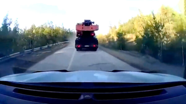 Als je door een vrachtwagen gedwongen wordt om achteruit te rijden